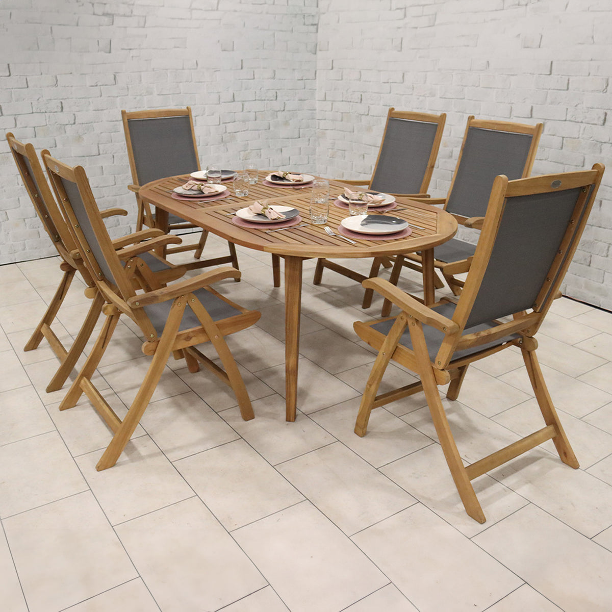 Ellipse FSC Table Set with 6 Recliner Folding Chairs from Roseland Furniture