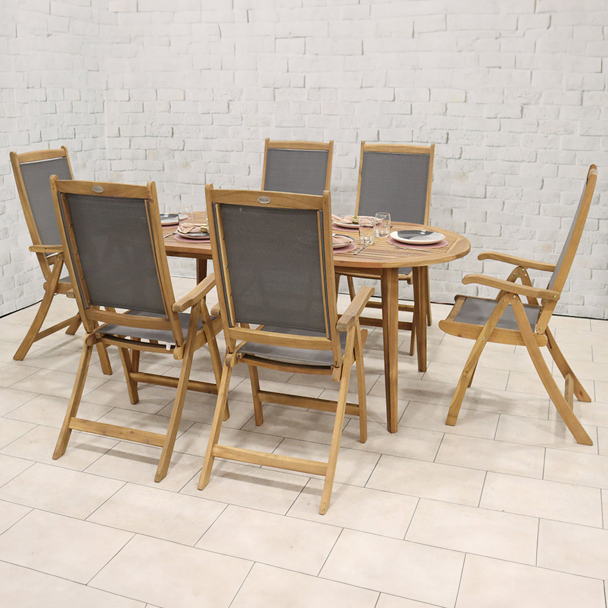 Ellipse FSC Table Set with 6 Recliner Folding Chairs from Roseland Furniture