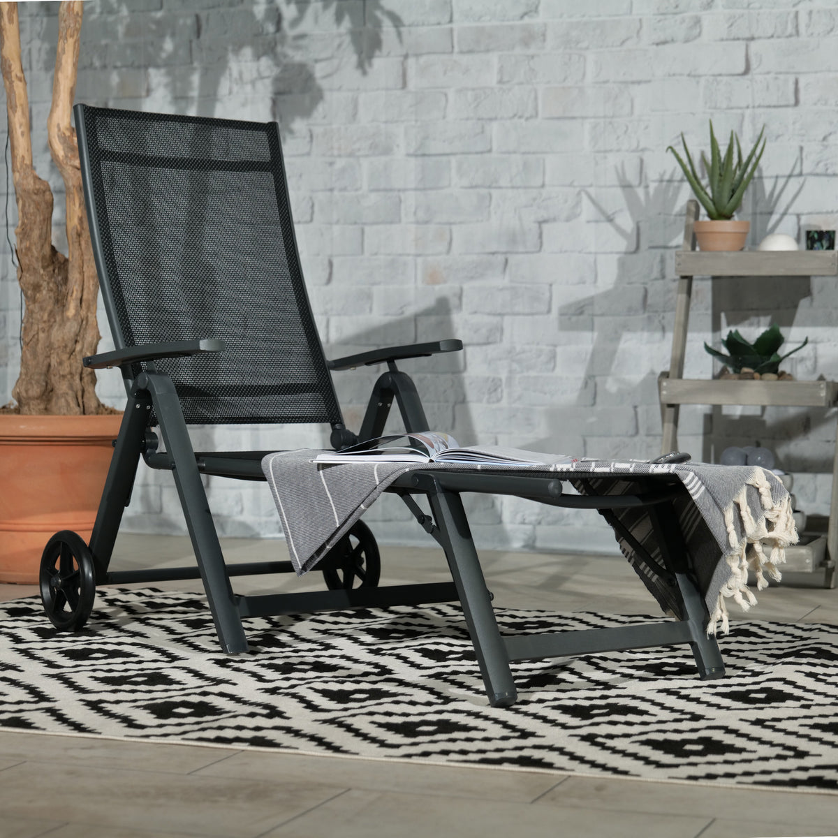 Sorrento Wheeled Sun Lounger Black from Roseland Furniture