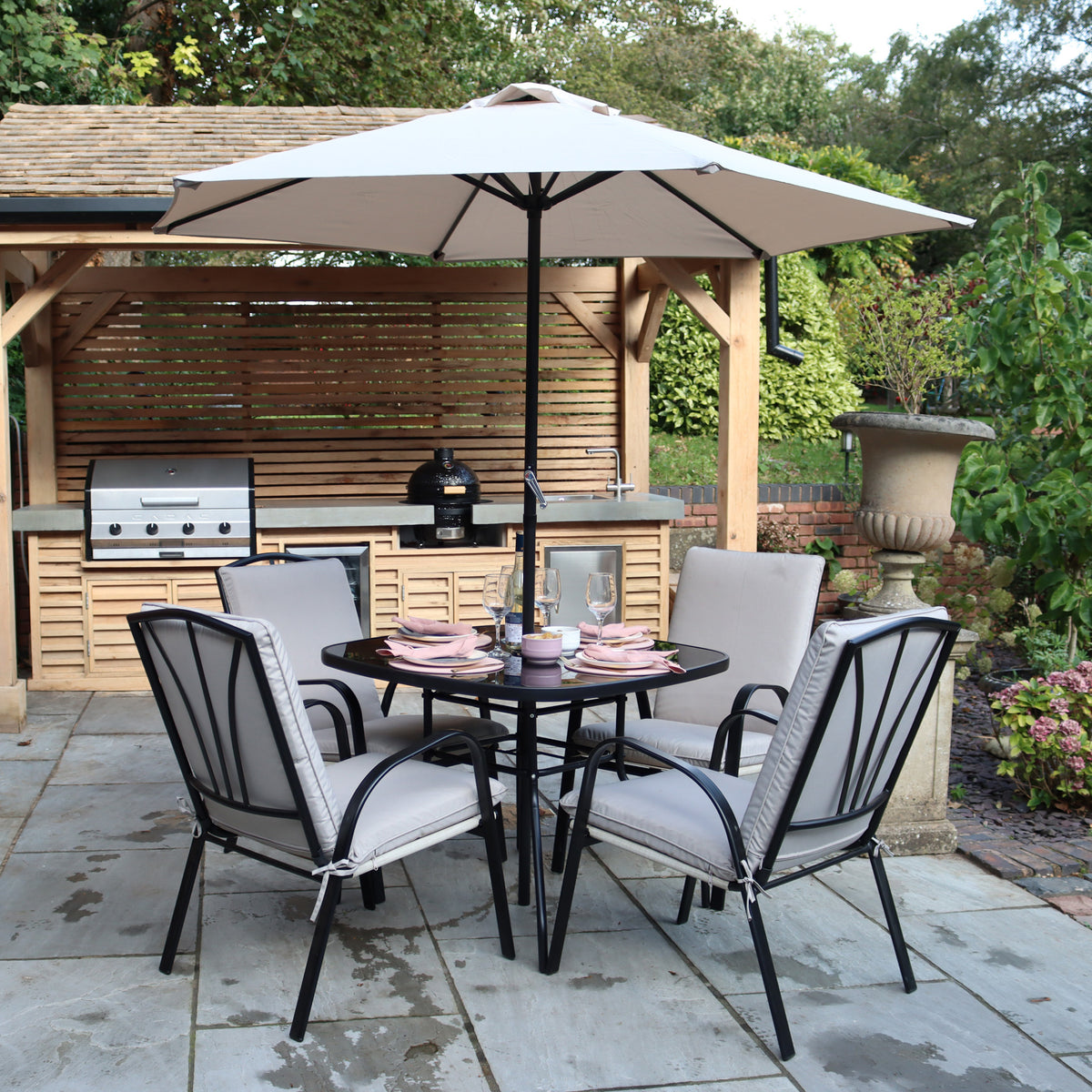 Amalfi 4 Seater Dining Set with Ivory Padded Cushions from Roseland Furniture