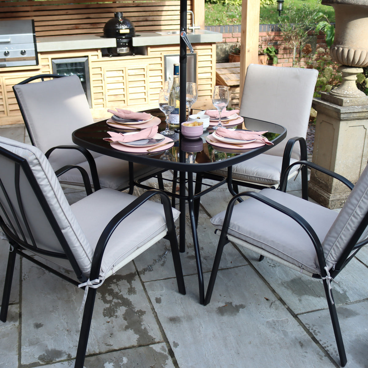 Amalfi 4 Seater Dining Set with Ivory Padded Cushions from Roseland Furniture