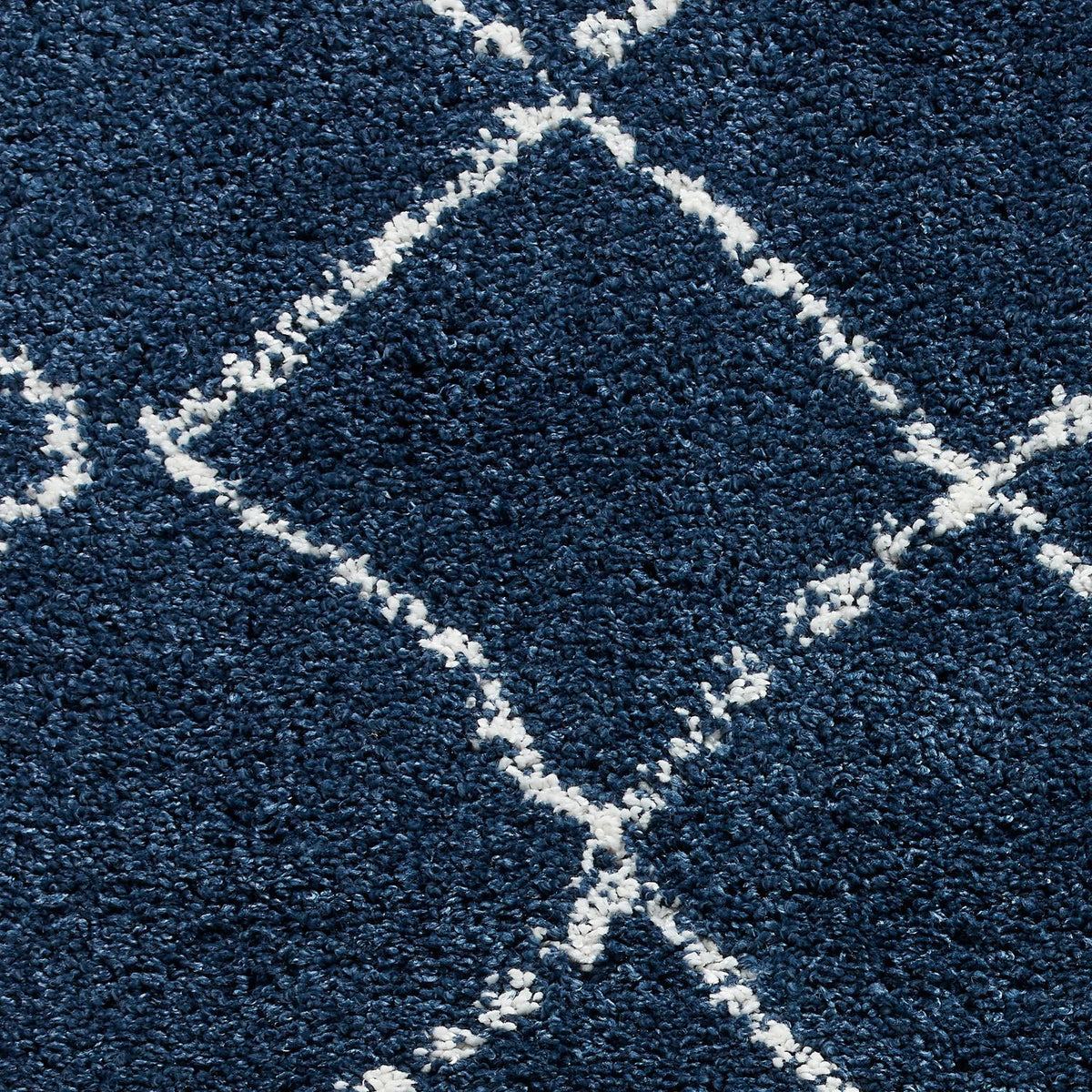 Navy Willow Shaggy Tasselled Diamond Rug from Roseland Furniture