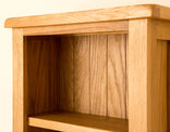 Lanner Oak Narrow Bookcase from Roseland Furniture