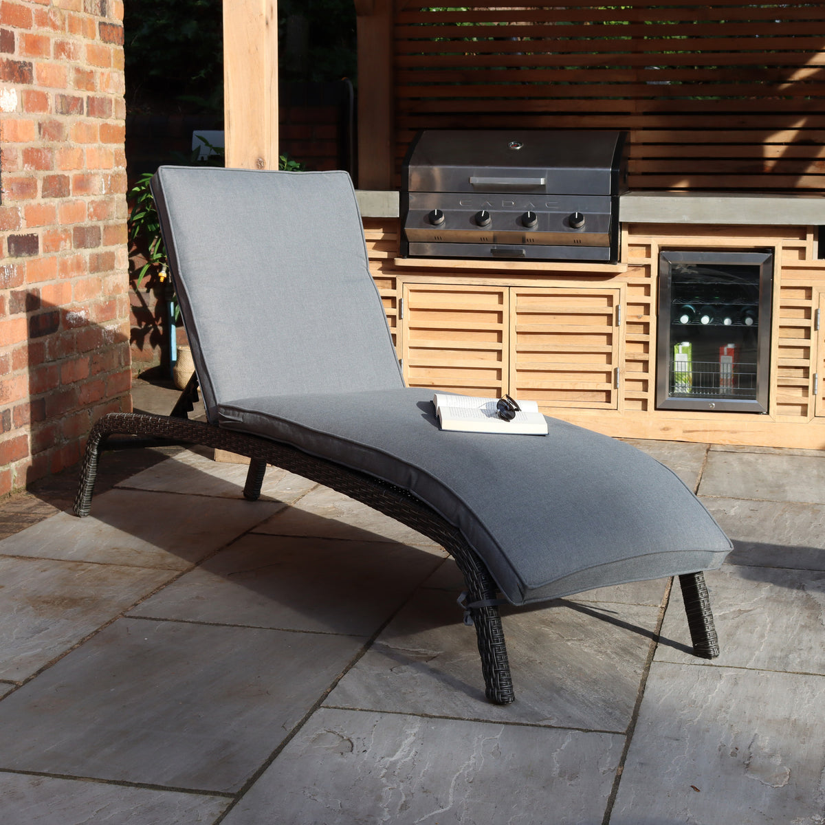 Paris Rattan Sunlounger with Multi Position Backrest and Cushion from Roseland Furniture