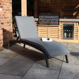 Paris Rattan Sunlounger with Multi Position Backrest and Cushion from Roseland Furniture