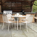 Porto Champagne 4 Seater Round Dining Set from Roseland Furniture