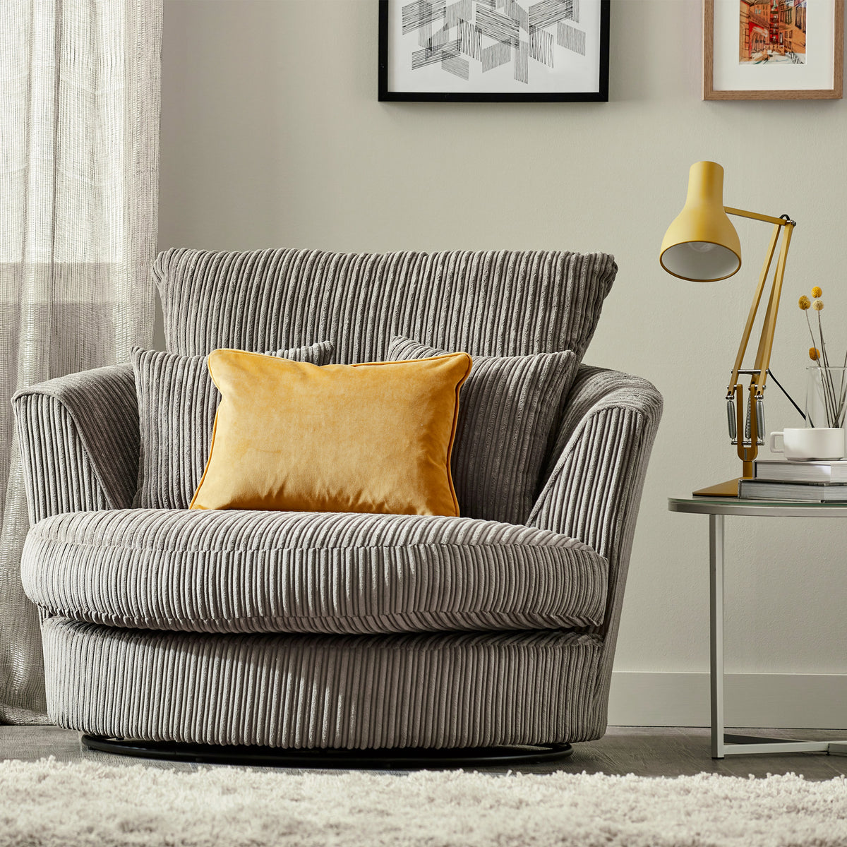Bletchley Charcoal Jumbo Cord Swivel Chair for living room
