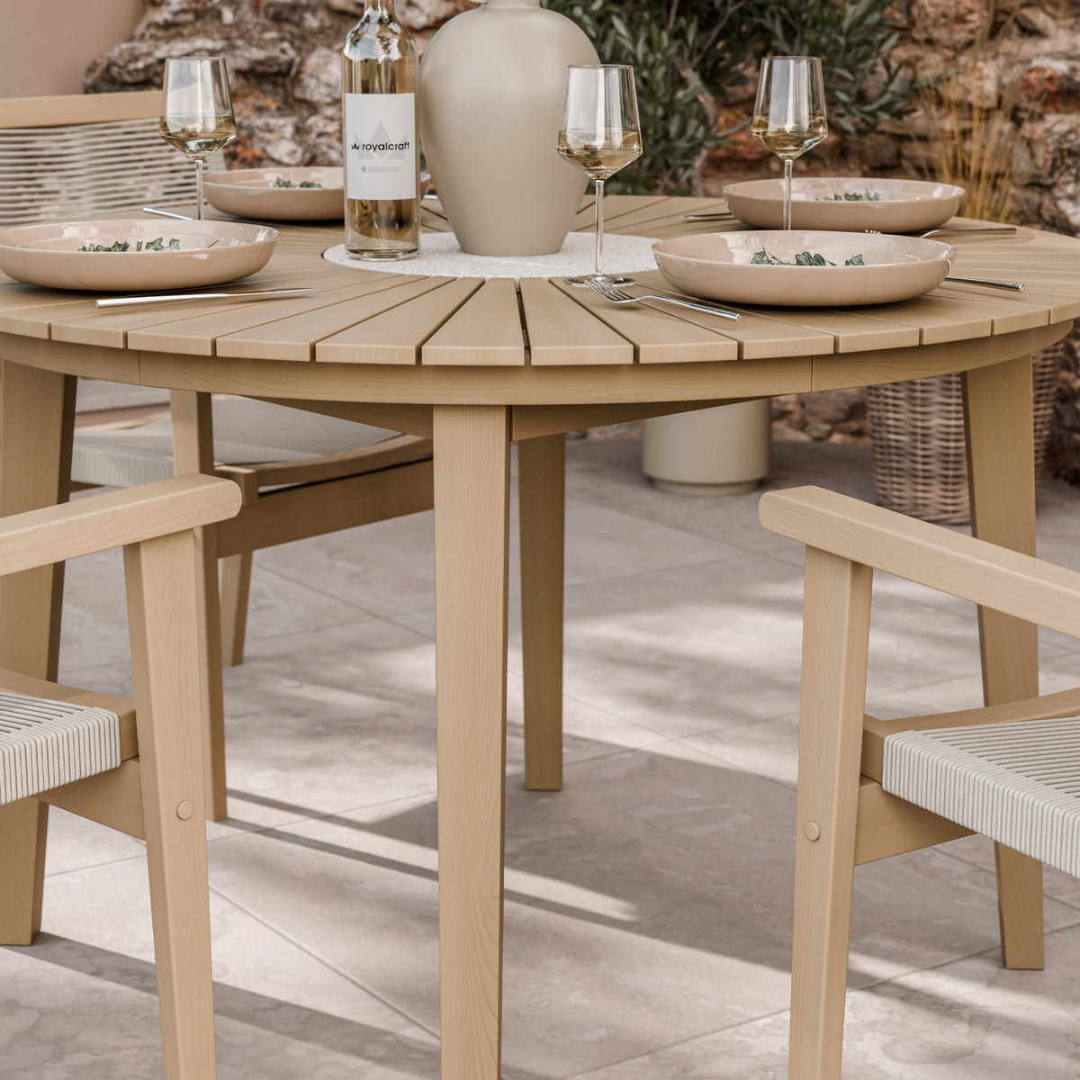 Roma 120cm Round Table 4 Roma Rope Stacking Chairs Concrete Insert from Roseland Furniture