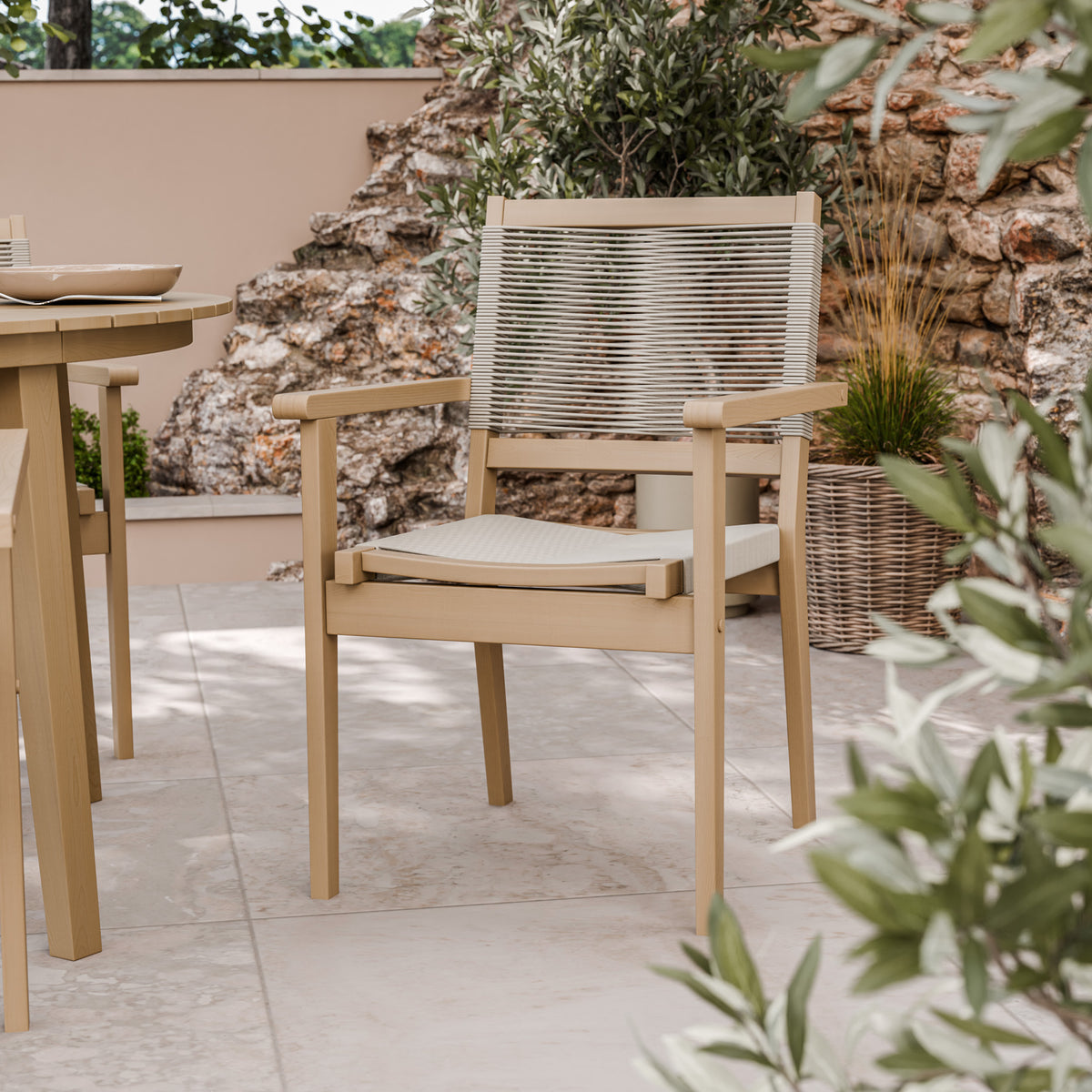 Roma 120cm Round Table 4 Roma Rope Stacking Chairs Concrete Insert from Roseland Furniture