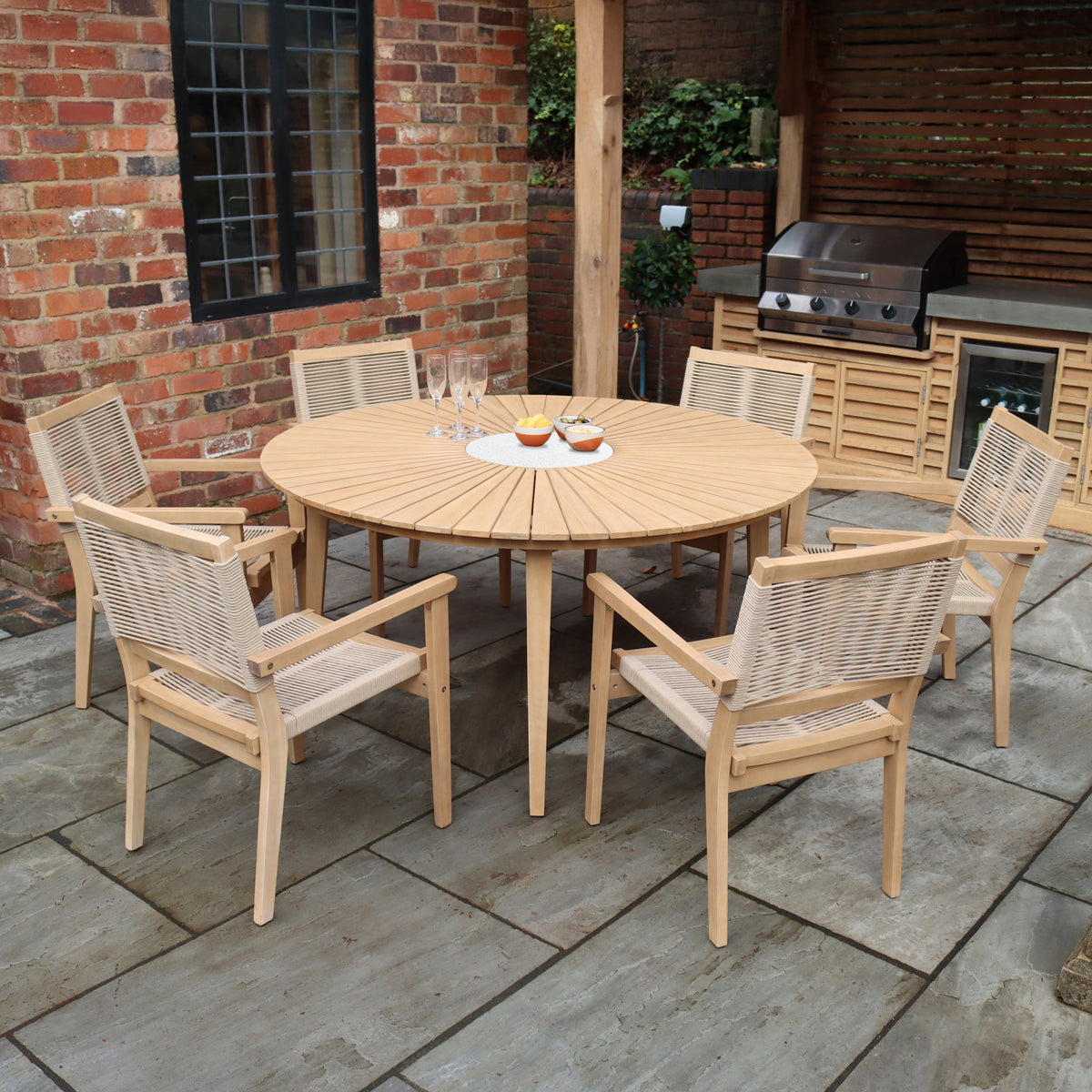 FSC 1 Roma 150cm Round Table w 6 Roma Rope Stacking Chairs Concrete Insert from Roseland Furniture
