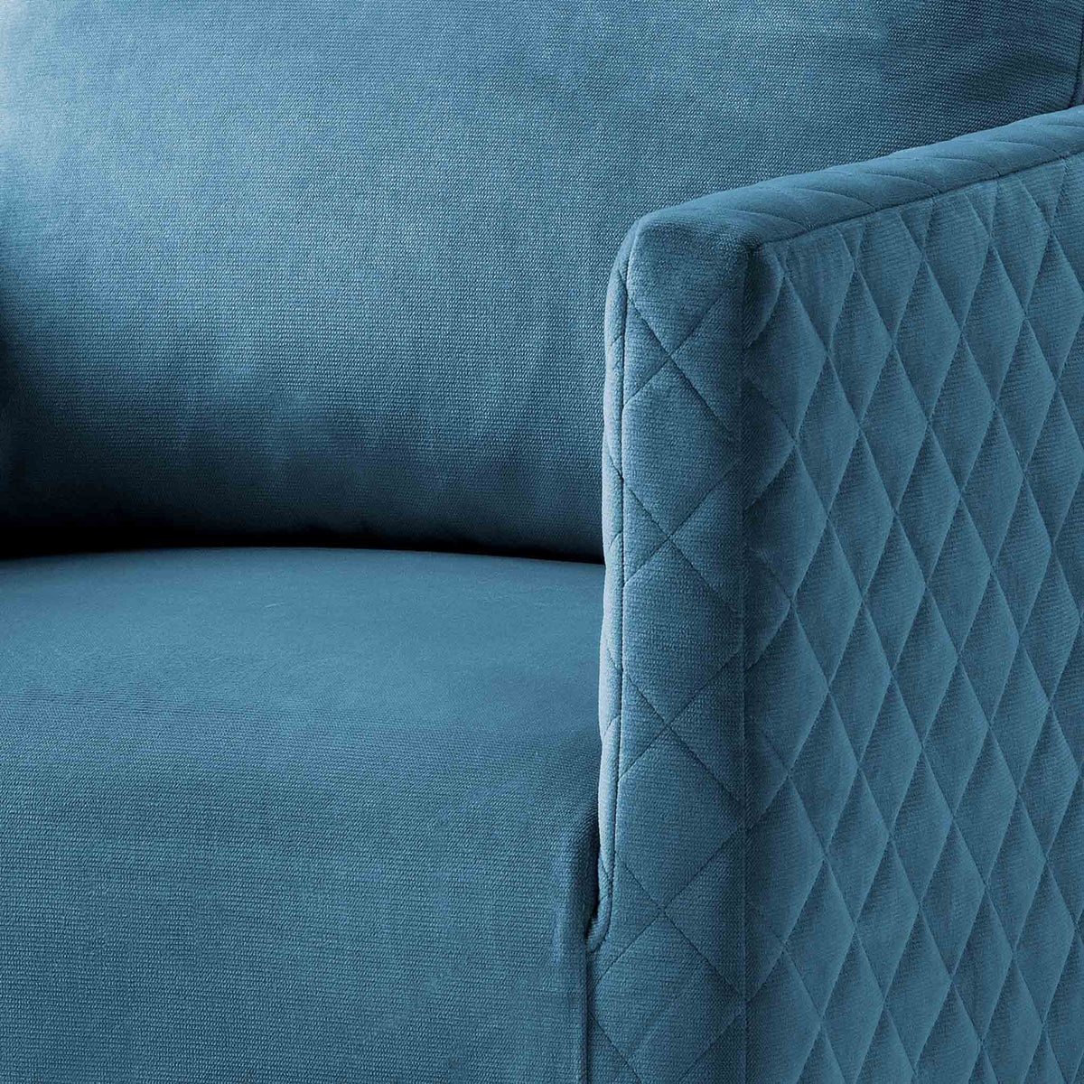 close up of the diamond stitching on the Bali Peacock Velvet Accent Chair