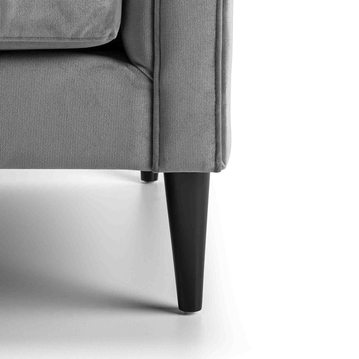 close up of mid century tapered wooden legs on the Savoy Grey Velvet 2 Seater Accent Chair