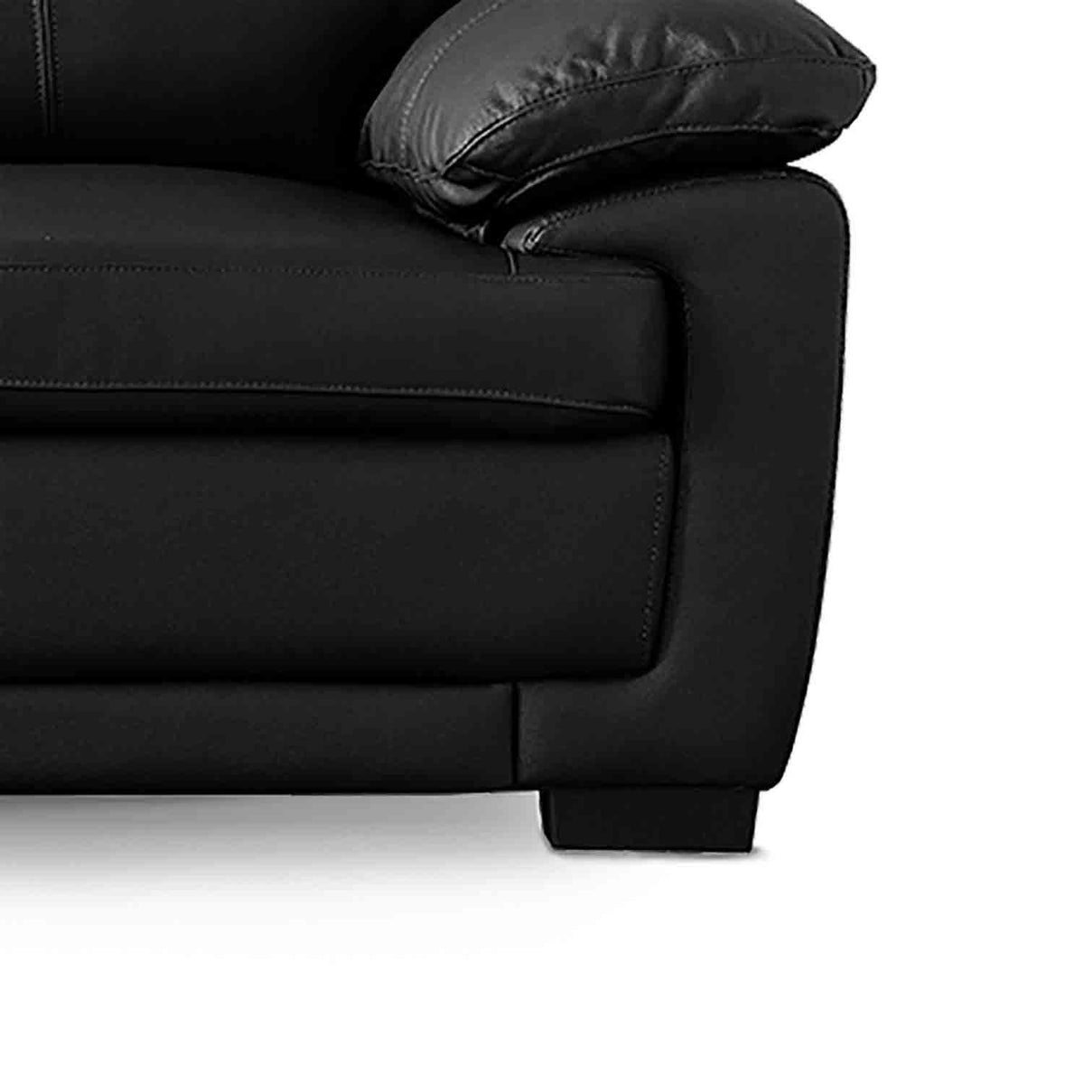 Hugo Black 3 Seater Leather Sofa - Close up of foot on sofa