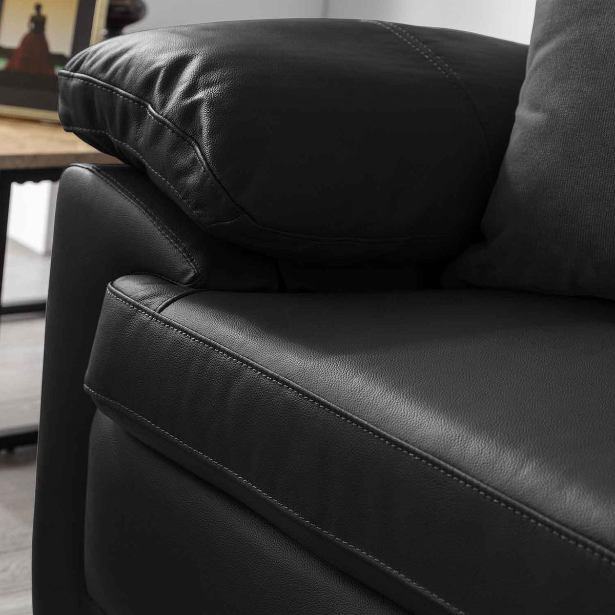 Hugo Black 3 Seater Leather Sofa - Close up of arm rest