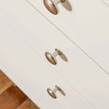 Close up of metal handles on The Cornish White Wooden Chest of Drawers 