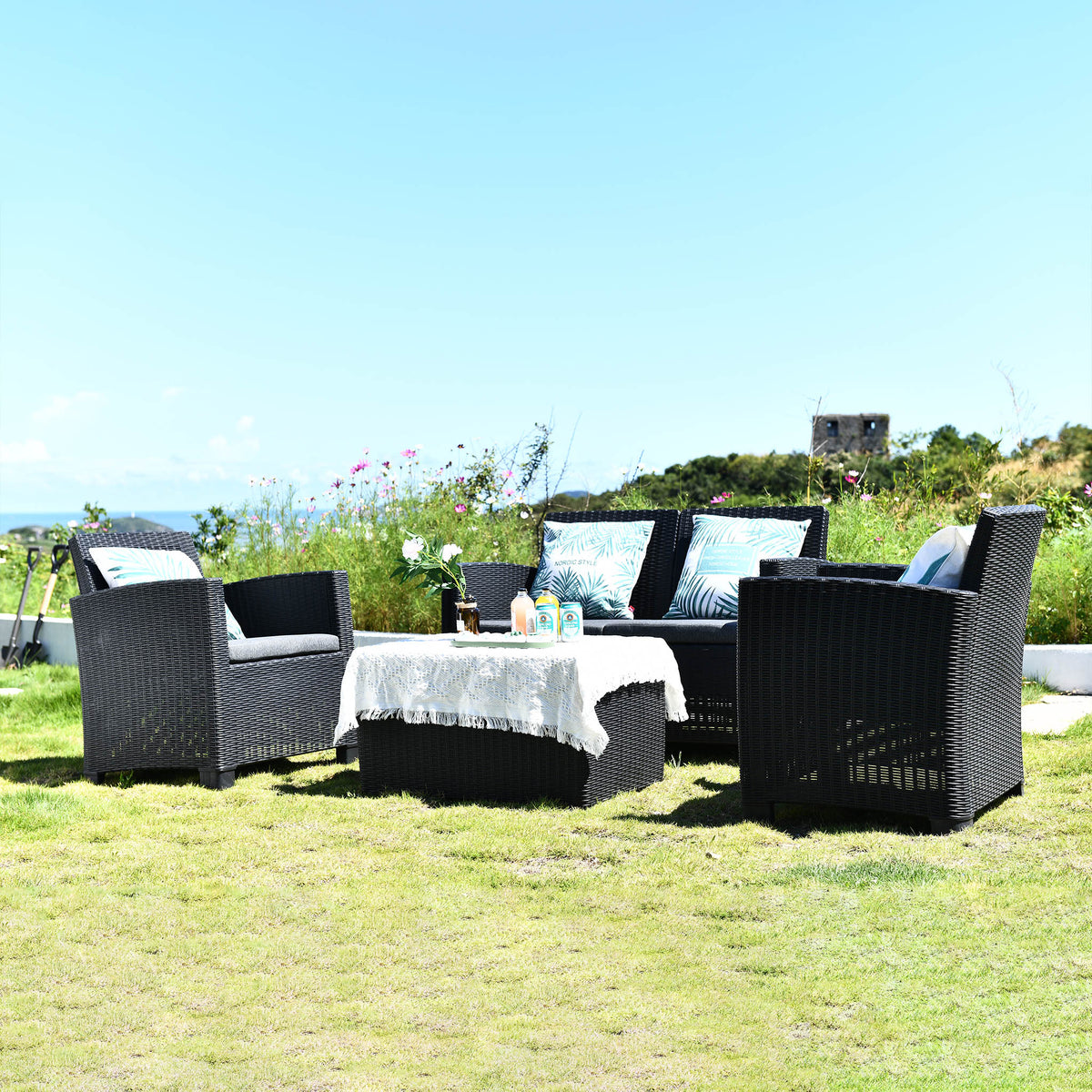 Faro Black 4 Seater storage lounge set Lifestyle setting