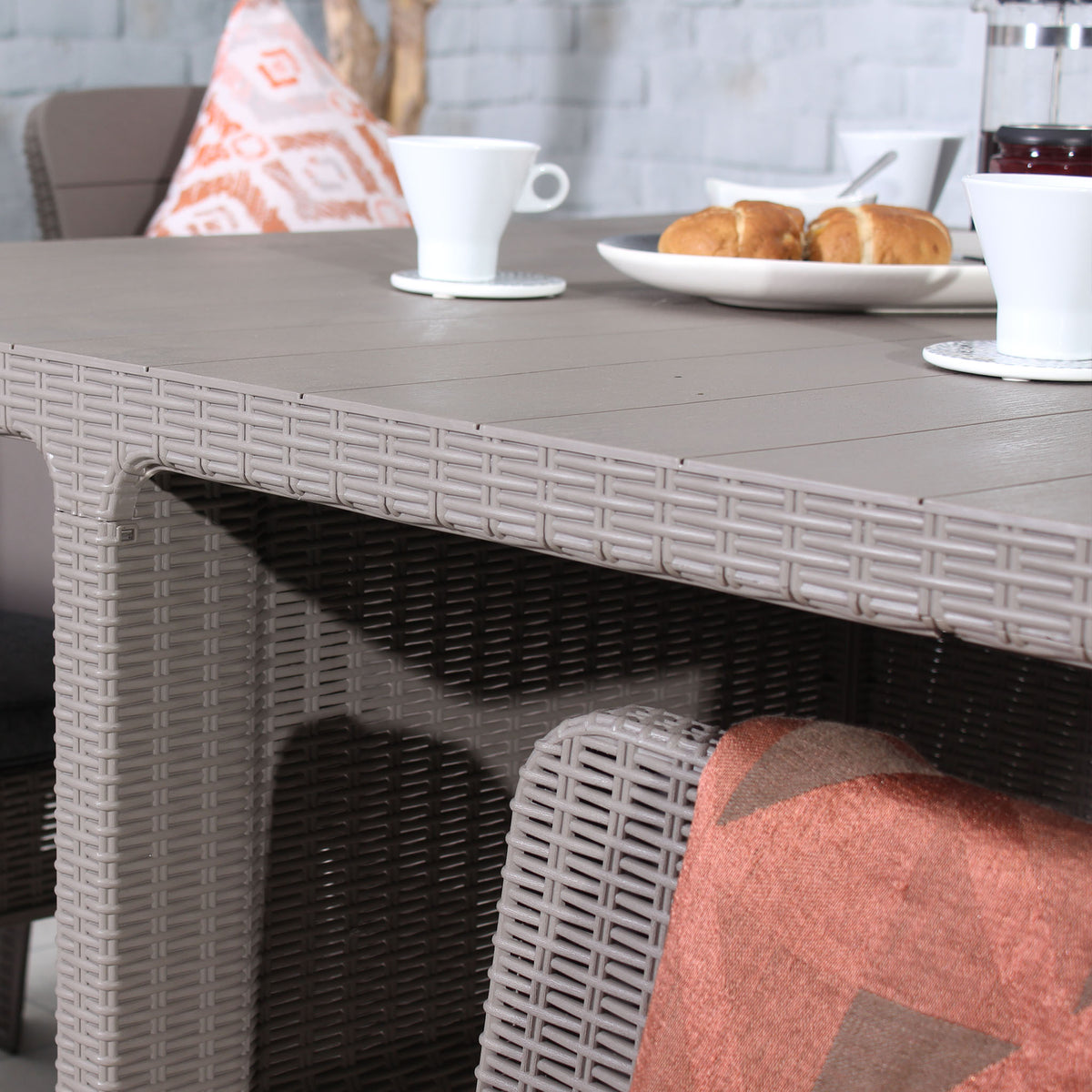 Faro 4 Seat Grey Taupe Cube Dining Set close up of rattan weave table