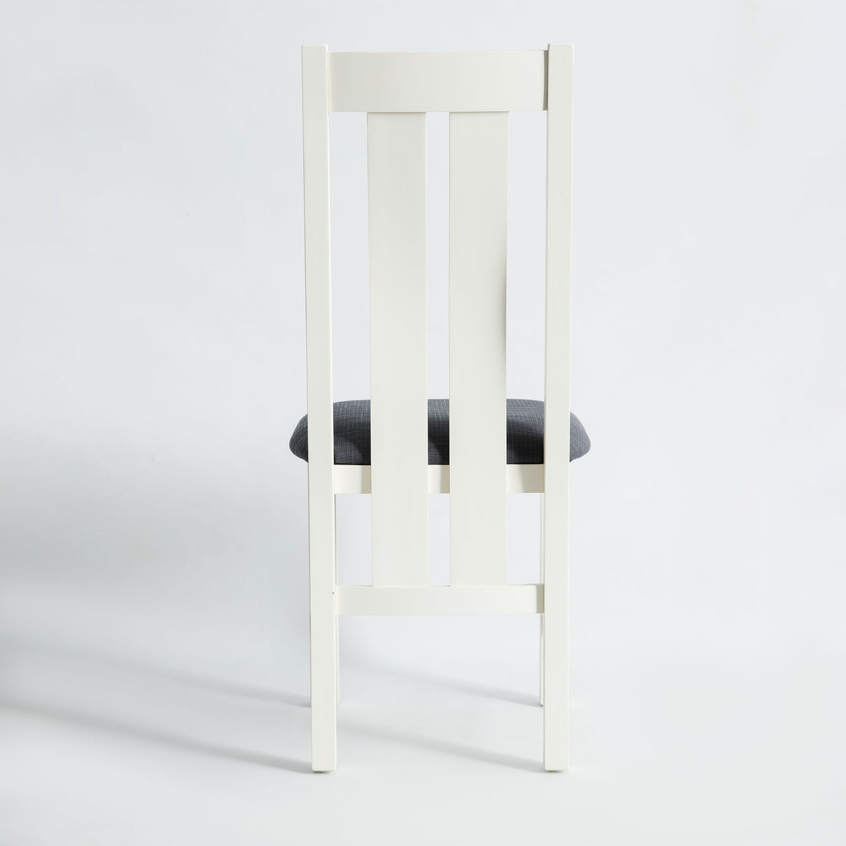 back view of the The Padstow White Wooden Dining Chair with Padded Seat