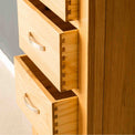 Dovetail joints on a London Oak Tallboy Chest.