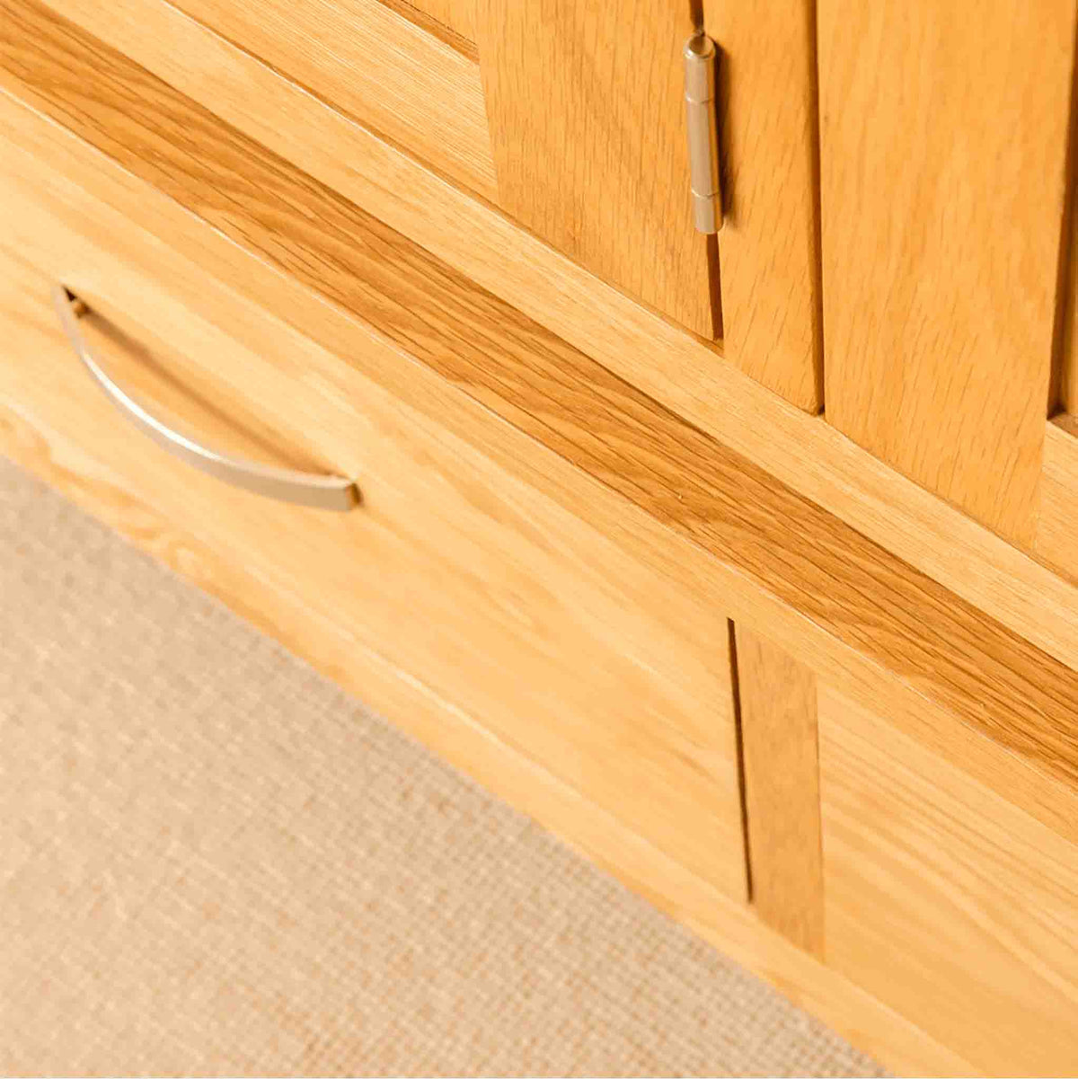 Close up of drawer and hinge on London Oak Large Wardrobe.
