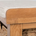 Surrey Oak Hall Bench with Baskets - Close up of edge of cushion bumper on bench