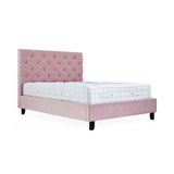 A pink upholstered bed with a tufted headboard and a white mattress stands against a white background.