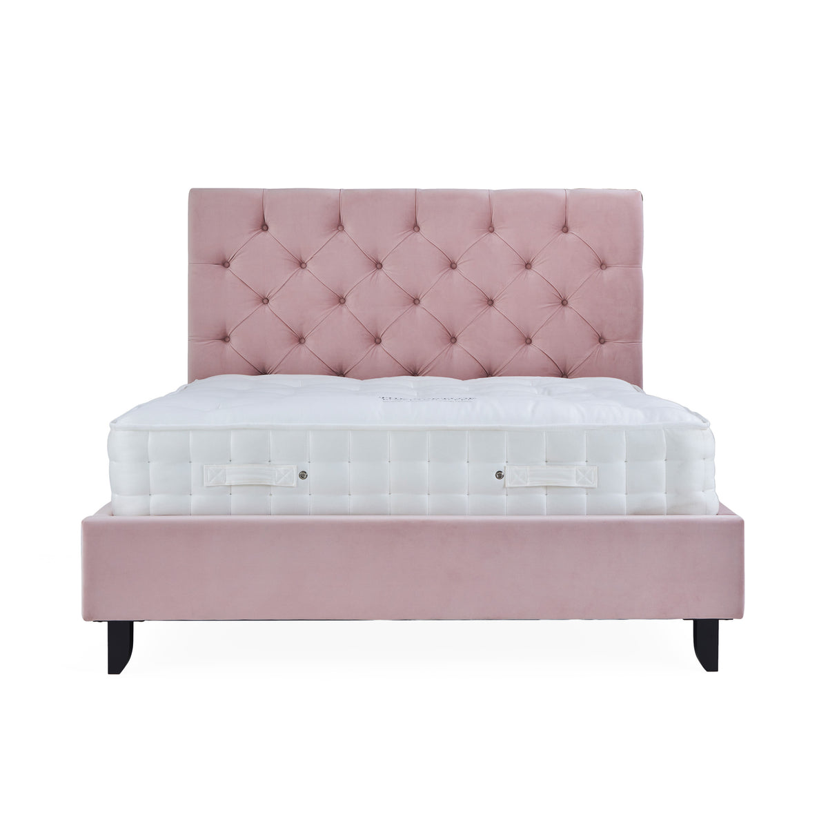 A pink tufted headboard attached to a matching platform bed frame with a white mattress on top, isolated against a white background.