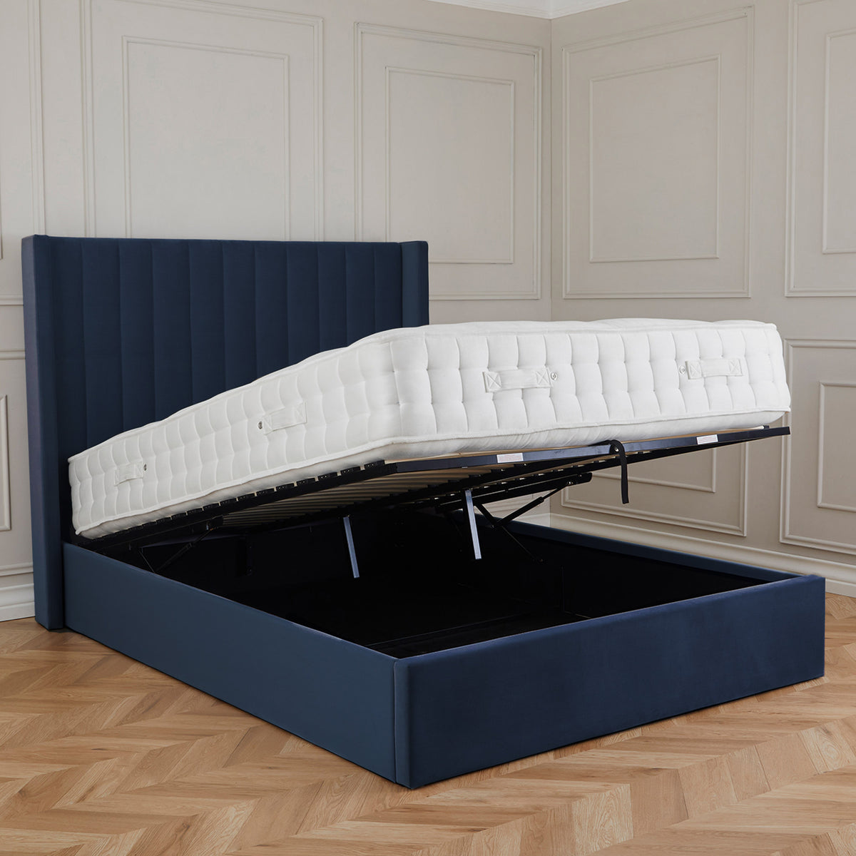 Maude Navy Velvet Ottoman Storage Bed Frame 