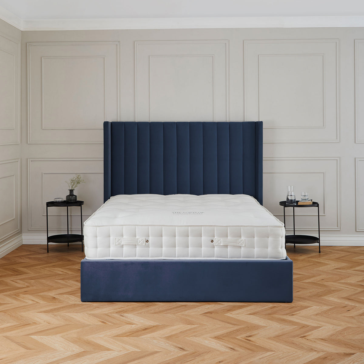 Maude Navy Velvet Ottoman Storage Bed Frame 