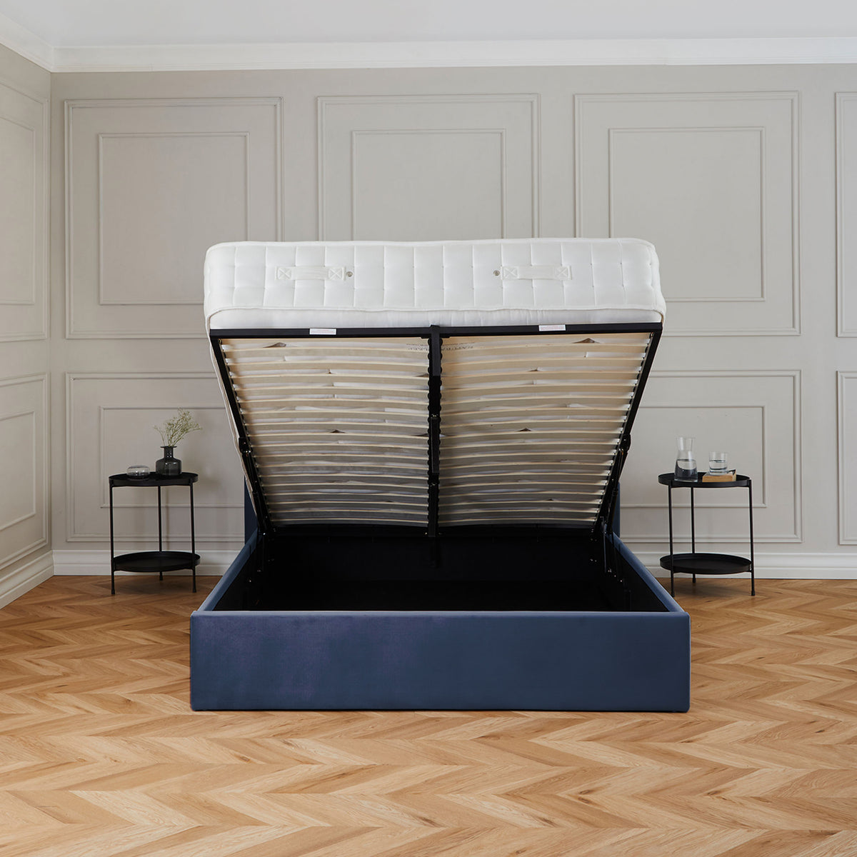 Maude Navy Velvet Ottoman Storage Bed Frame 