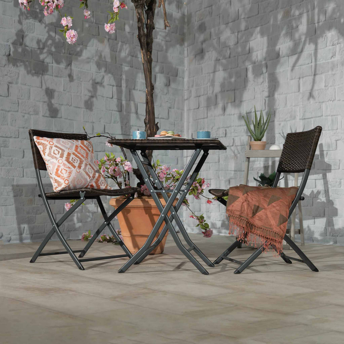 Vada Brown Rattan Folding Bistro Set - Lifestyle