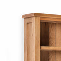 Surrey Oak Slim Bookcase - Close up of top corner