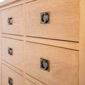 Surrey Oak Large Chest Of Drawers - Close up of drawer fronts from side view