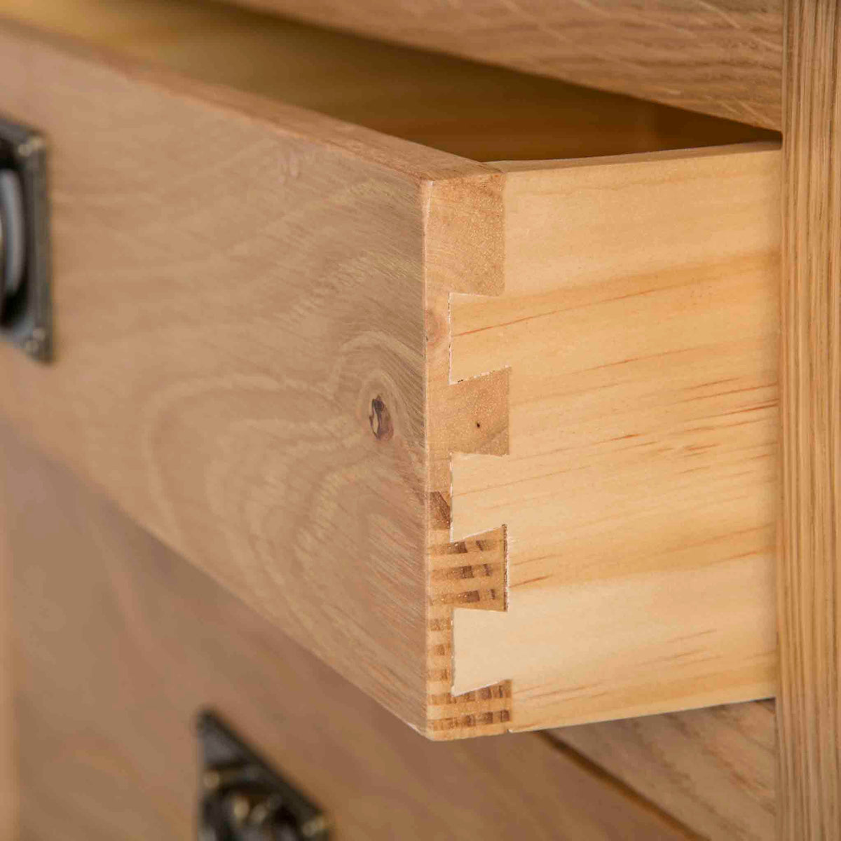 Surrey Oak Large Chest Of Drawers - Close up of dovetail joint on drawers