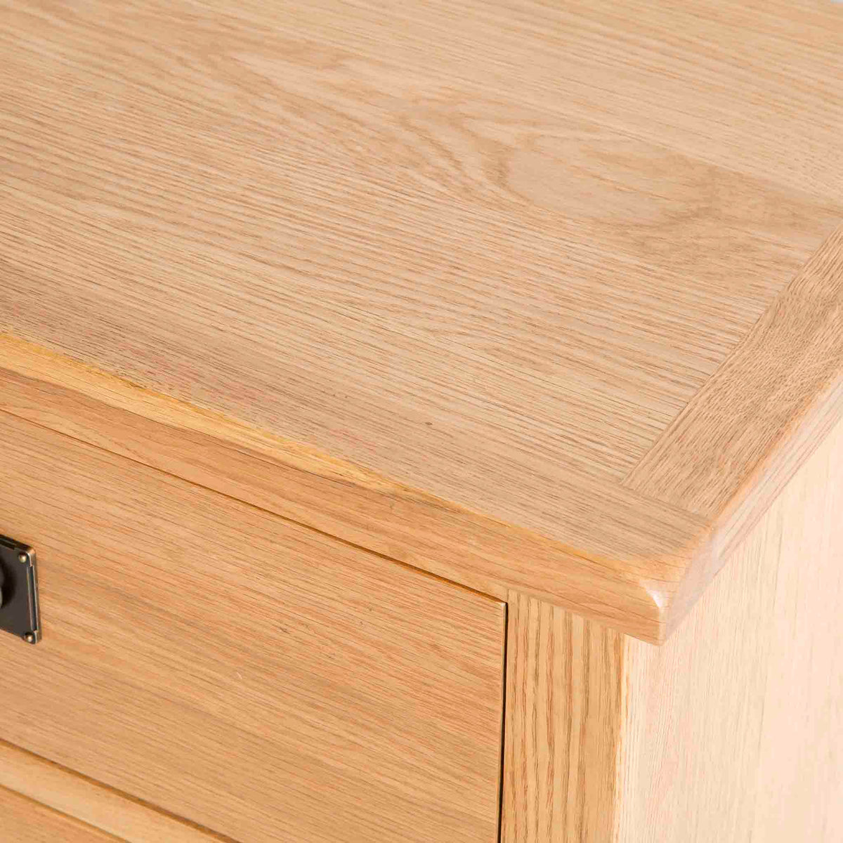 Surrey Oak Large Chest Of Drawers - Close up of top corner
