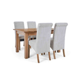 4 Natural Chairs with the closed Falmouth Oak Large Extending Dining Table