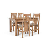 4 Wheat Slatted Chairs with the closed Falmouth Oak Large Extending Dining Table
