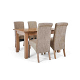 4 Wheat Bibury Chairs with the closed Falmouth Oak Large Extending Dining Table