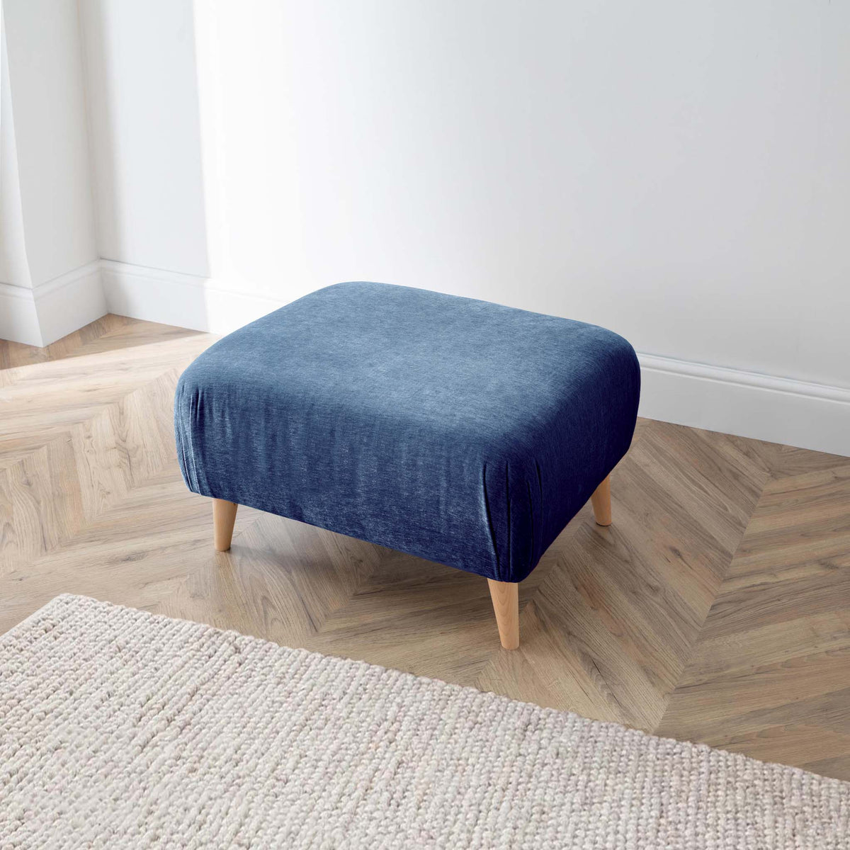 Rowen navy footstool from roseland