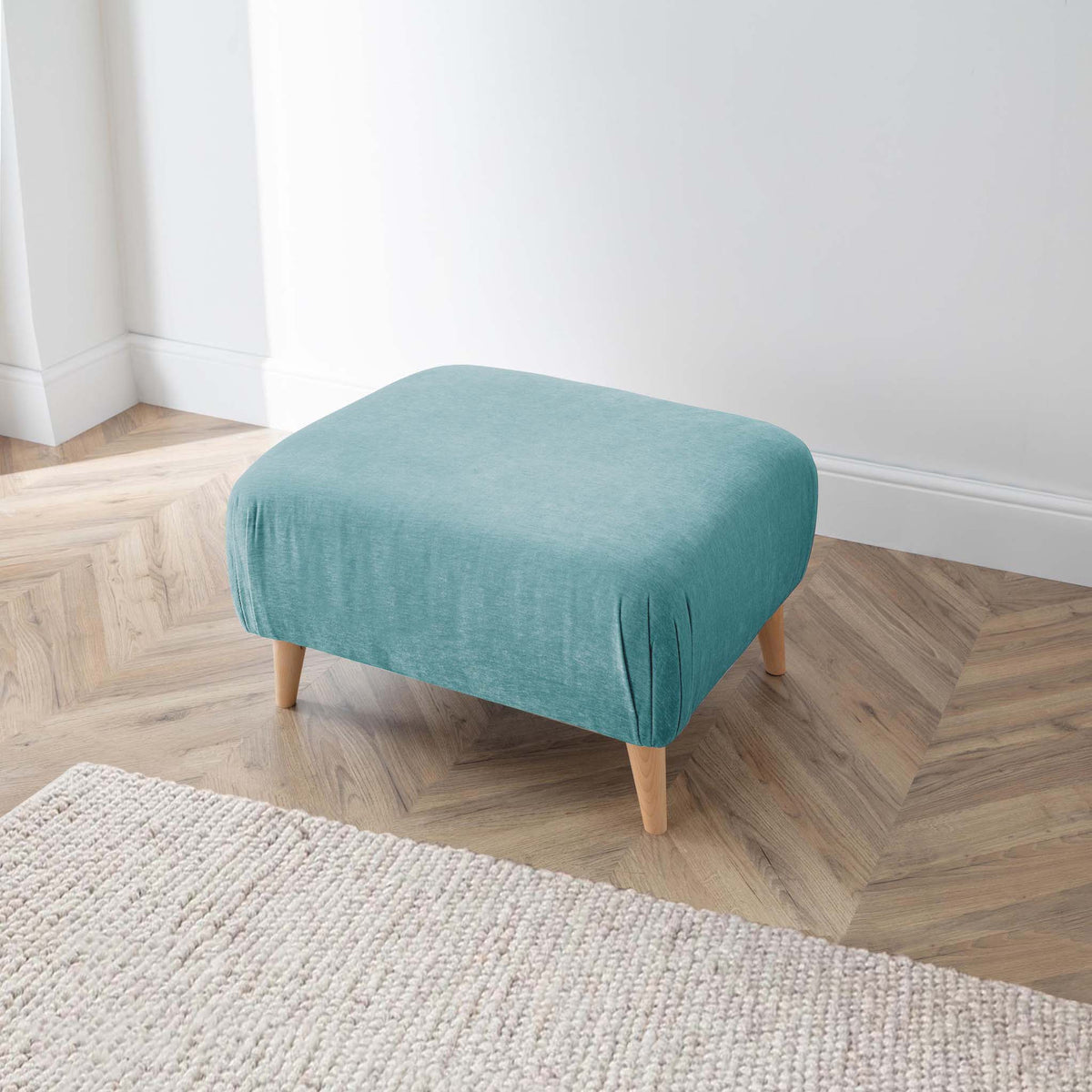 Rowen lagoon footstool from roseland