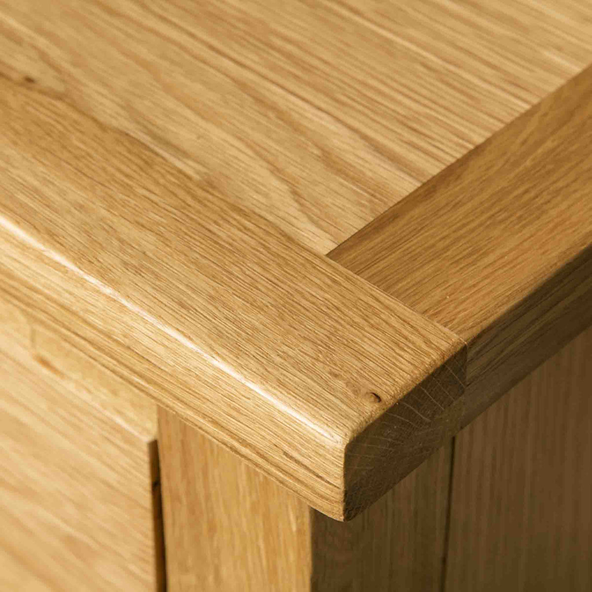 Close up of the natural oak on a London Oak Large Smart TV Stand.