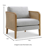 A wooden armchair with light gray cushions and rattan side panels. Measurements indicating height, width, and depth are displayed. Text: "Image for size information only".