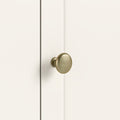 Belmont Coconut White brass round handle close up 