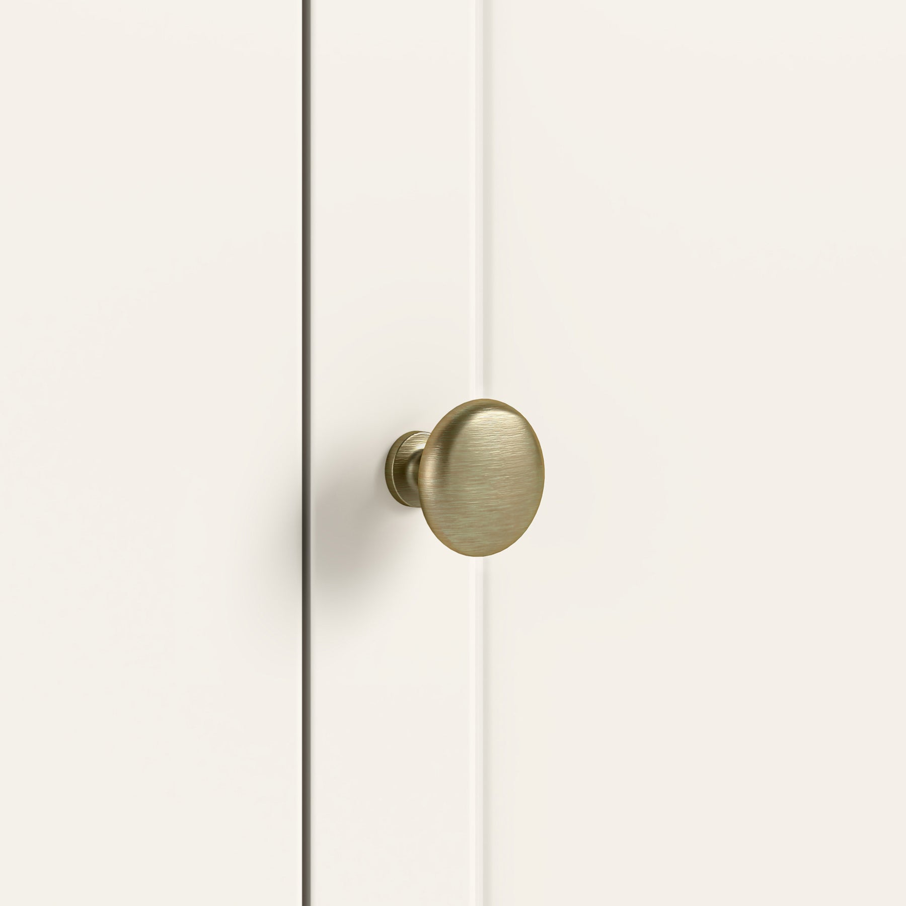 Belmont Coconut White brass round handle close up 