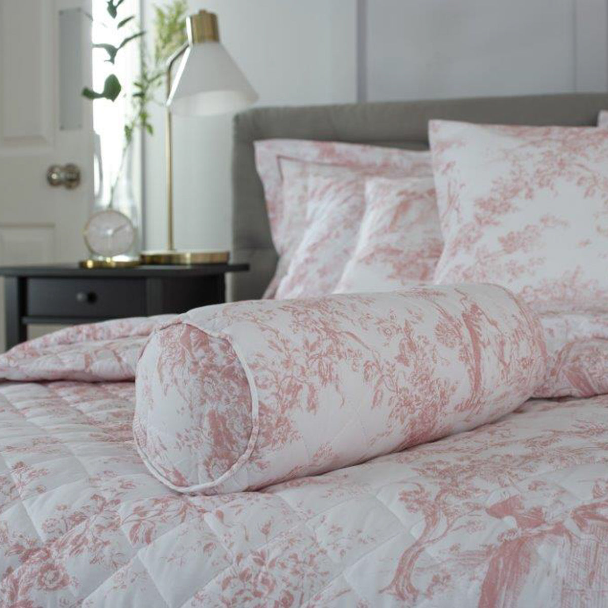 Toile De Jouy Bolster Cushion Pink from Roseland Furniture