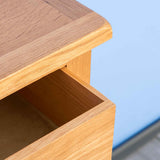 Surrey Oak 5 Wide Drawer Chest close up of top edge