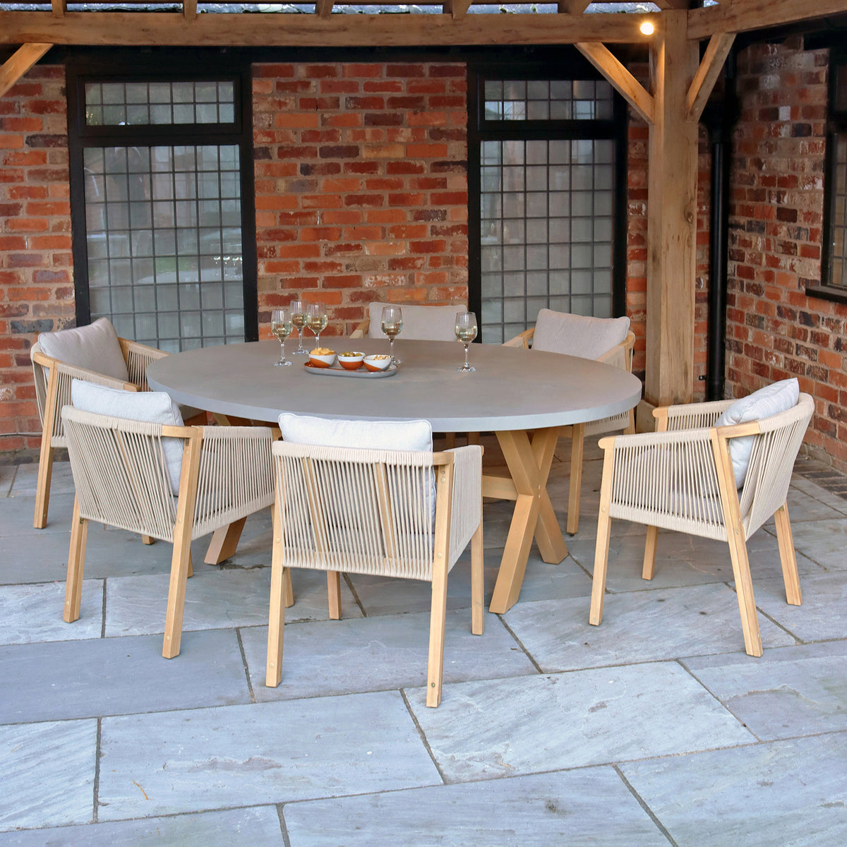 Luna 180cm x 130cm Ellipse Concrete Table Set with 6 Dining Chairs from Roseland Furniture