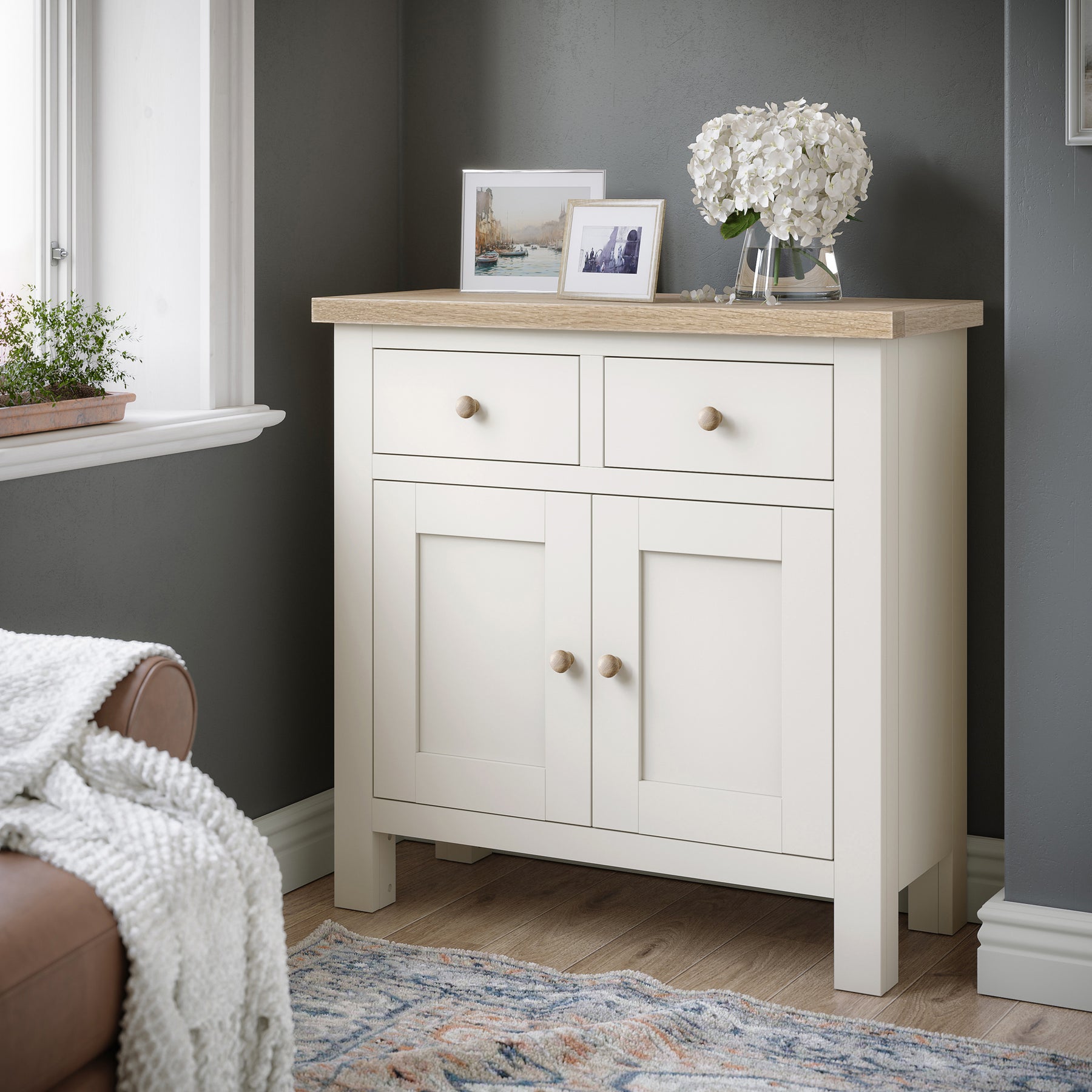 Farrow Coconut White Mini Sideboard with wooden handles from Roseland Furniture