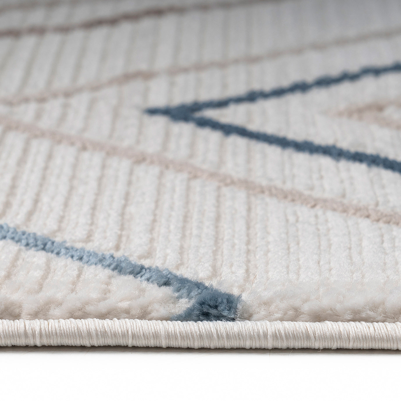 Tilden Soft Geometric Design Rug close up from Roseland Furniture