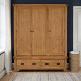 Zelah Oak Triple Wardrobe with Drawers from Roseland Furniture